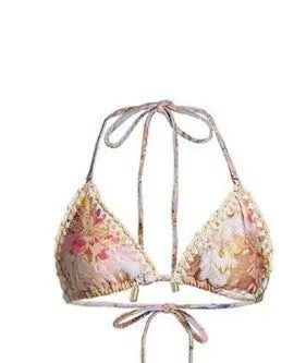 Women's creamy-white floral nylon bikini set with detachable skirt shown in sizes S-XXL