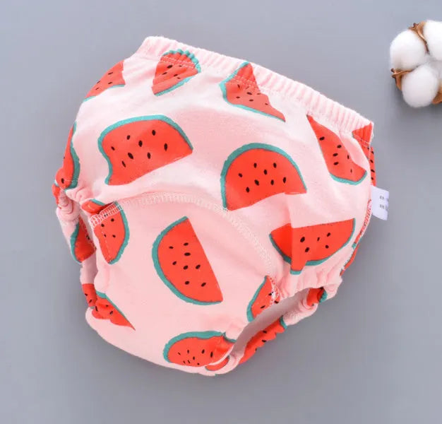 Pure cotton washable baby training pants in a giraffe print design, showing the 6-layer gauze construction.