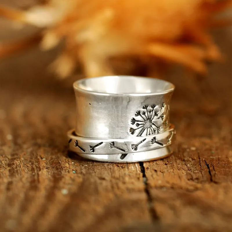 Silver electroplated flower ring with rotatable charm in European trendy design