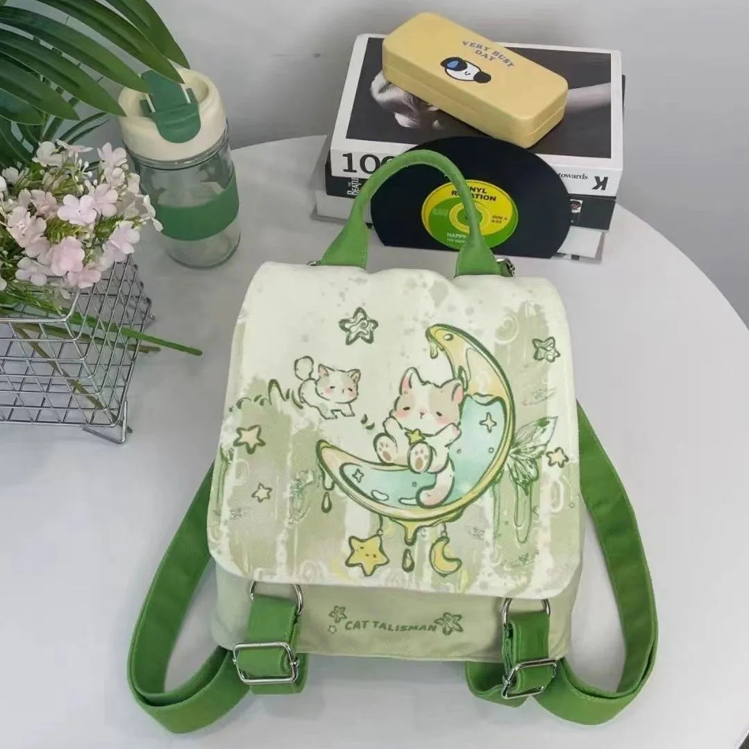 Mint green backpack with spliced design, polyester fabric, and sandwich pockets on neutral background.
