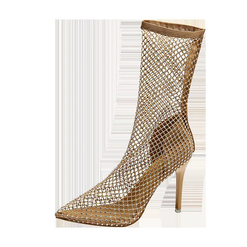 Metallic gold women's high heel sandals with a mesh oversleeve design and pointed stiletto toe.