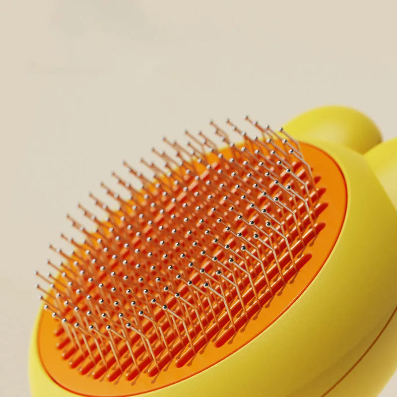 Green self-cleaning pet brush with release button and stainless steel comb on a white background.
