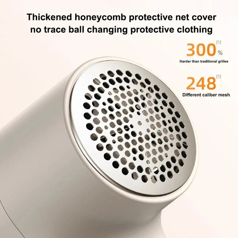 White electric lint remover with LED display and USB charging port for fabric hairball removal
