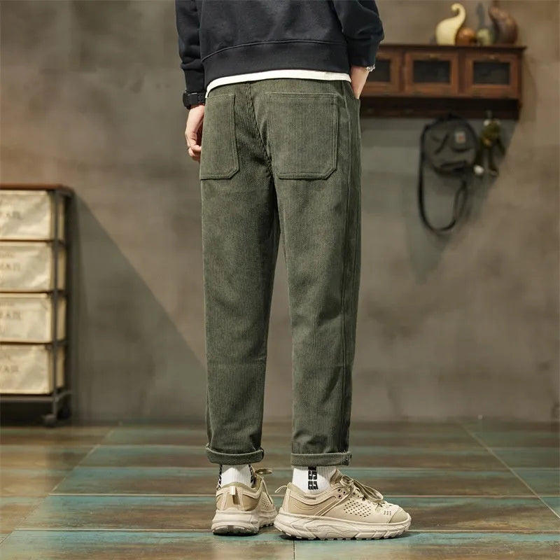 Corduroy men's straight-leg casual trousers in tapered street fashion style with mid-waist design