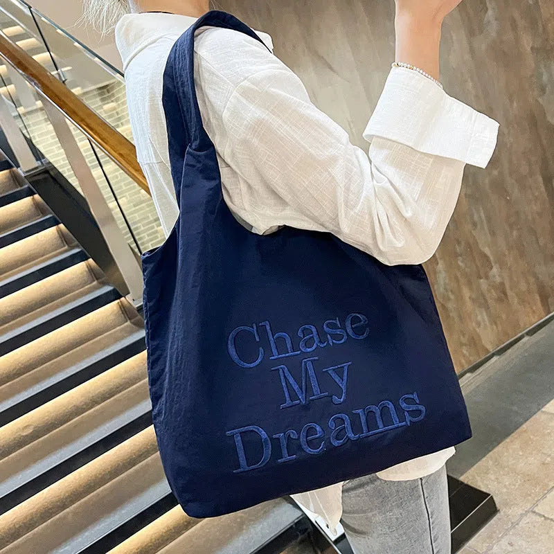 Korean-style 3D Letter shoulder bag with minimalist embroidery in nylon, available in four colours