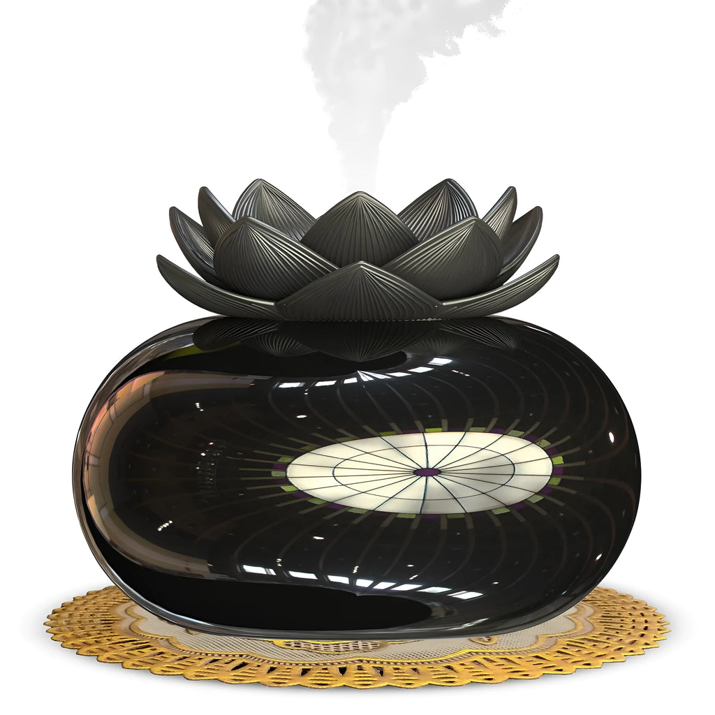 Round pure black lotus aromatherapy ultrasonic humidifier with USB cable.