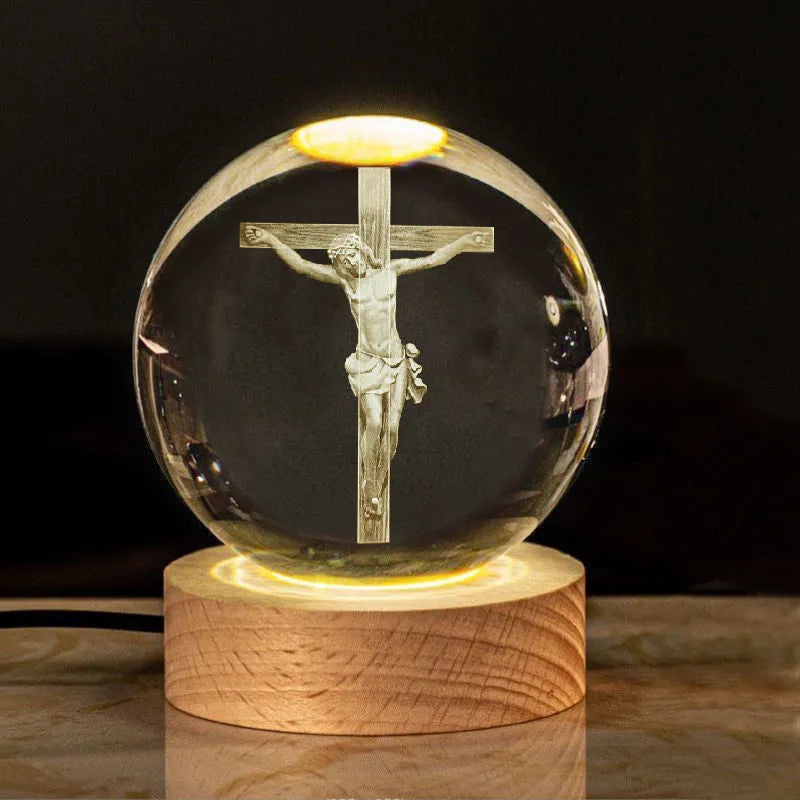 White crystal ball desk lamp with warm light on a solid wood base.