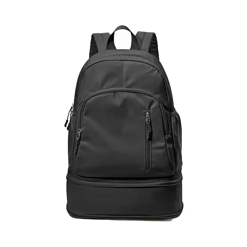Waterproof polyester travel backpack in black colour showing curved shoulder straps and contrast stitching details