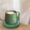 White USB coffee mug warmer heating pad on a wooden desk