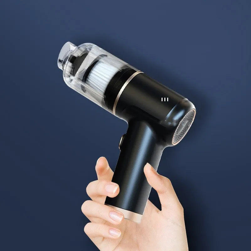 Black wireless handheld car vacuum cleaner with assorted nozzles and a USB cable