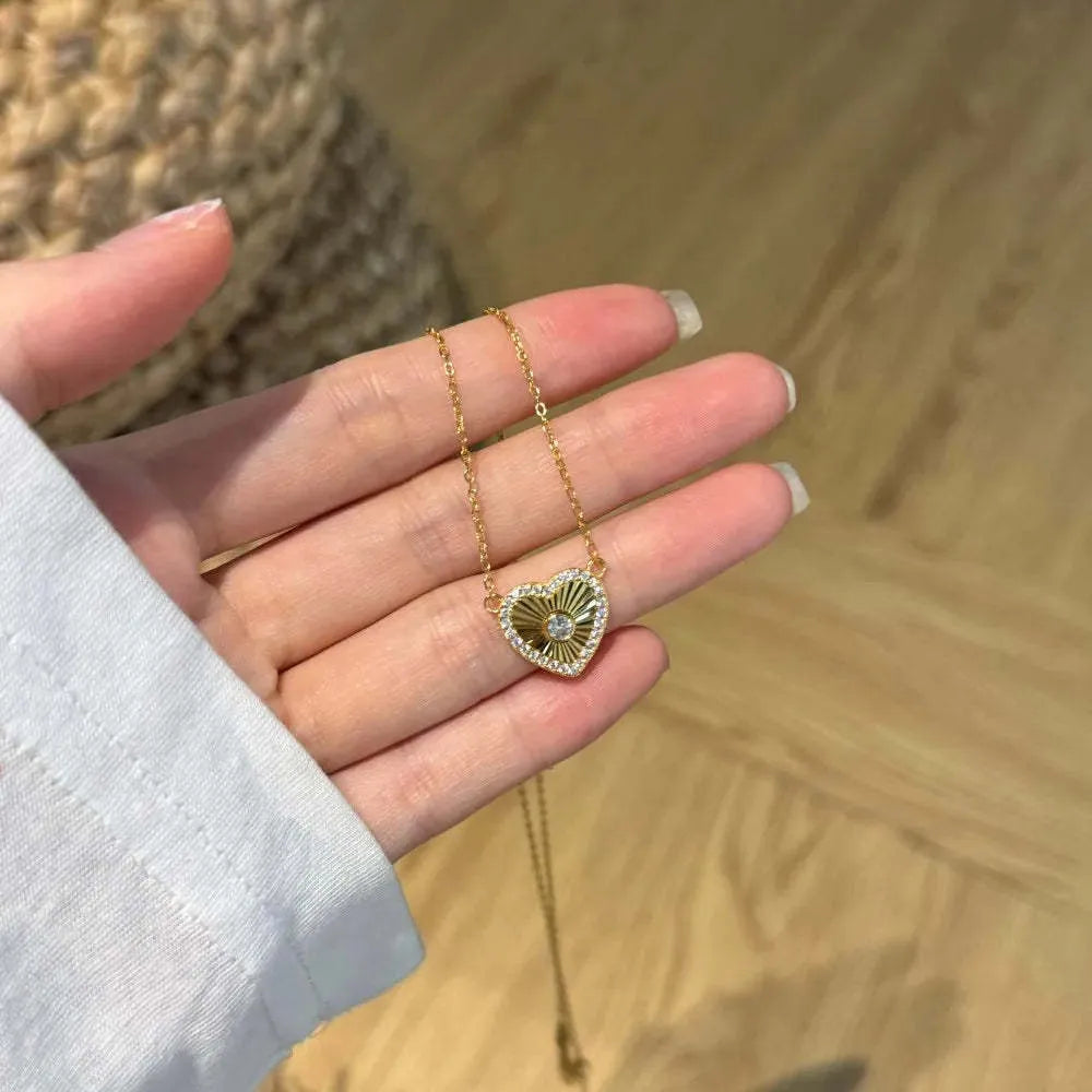 Gold colour 925 sterling silver necklace with retro heart and totem pendant on a clavicle chain