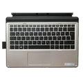 Elite X2 thin portable keyboard with PS/2 cable and wireless dongle on a wooden desk next to a tablet.