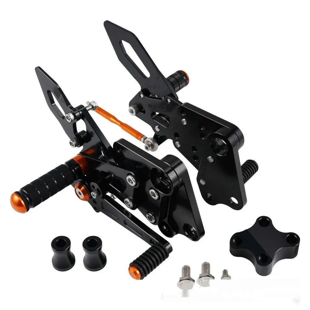 Black and orange KTM DUKE motorcycle footpeg bracket assembly for 125 200 250 390 models