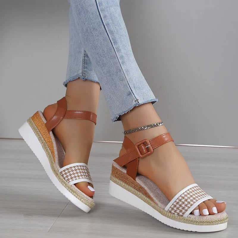Women's houndstooth print buckle sandals in black with fish mouth toe on light background