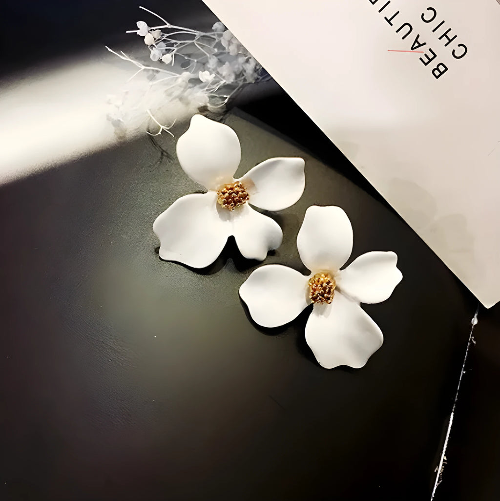 Women's flower stud earrings in pink and white colours with electroplated finish