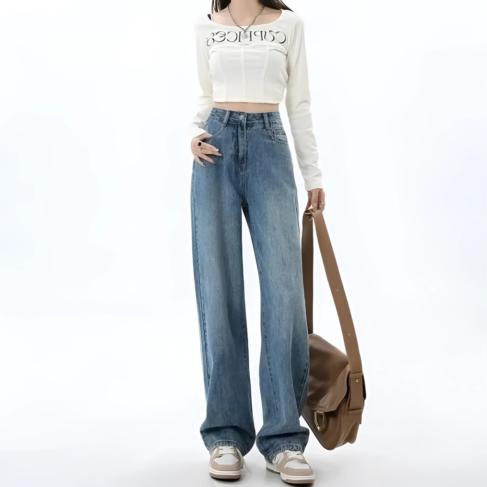 Women's retro blue high-waisted wide-leg denim jeans on a hanger, showing the straight-leg cut.