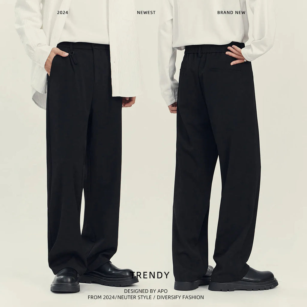 Man's loose-fit straight-leg business casual trousers in grey, laid flat showing waistband and full length.