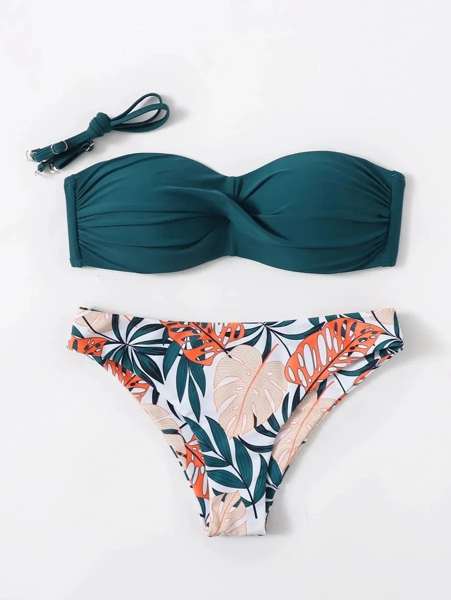Green hard cup push up bikini swimsuit set with briefs bottom on a mannequin.