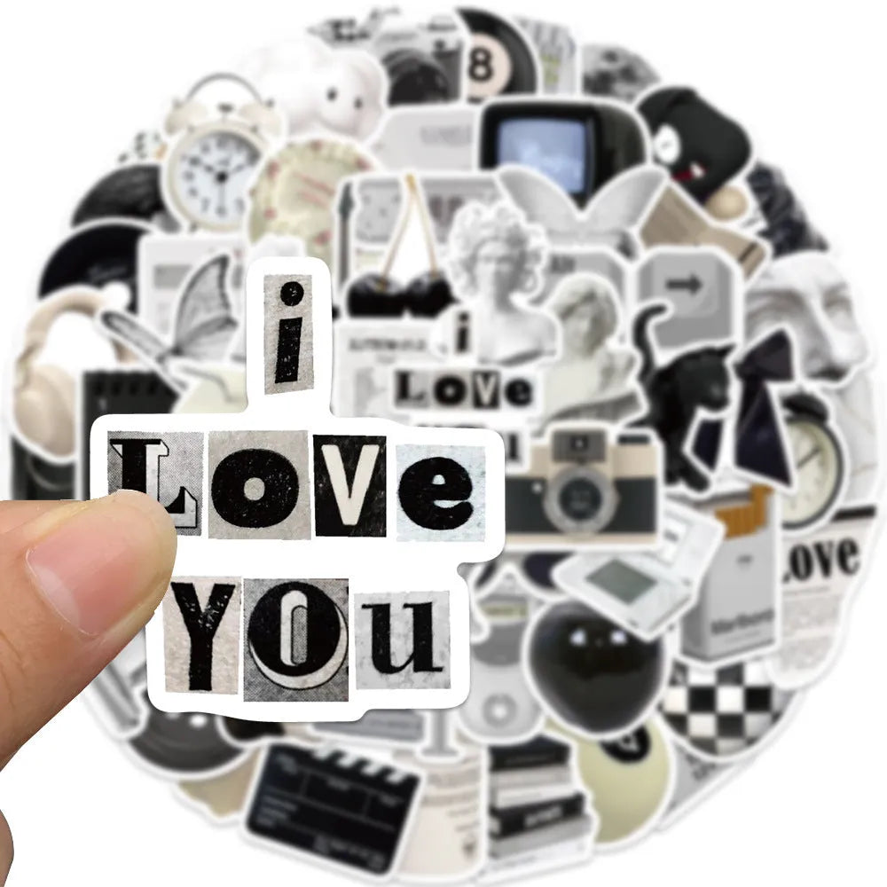 Set of 61 black and white waterproof PVC stickers for laptops, phones, luggage, and other personal items.