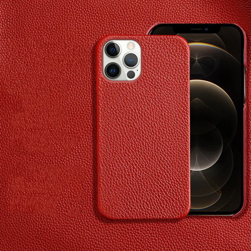 Genuine brown cowhide leather iPhone case with simple half line design on an iPhone 14 Pro Max.