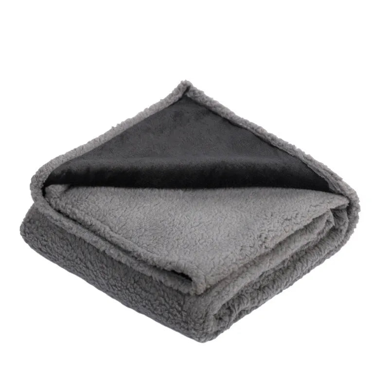 Flannel fleece composite thickened waterproof pet pad for dogs in blue gray on a floor