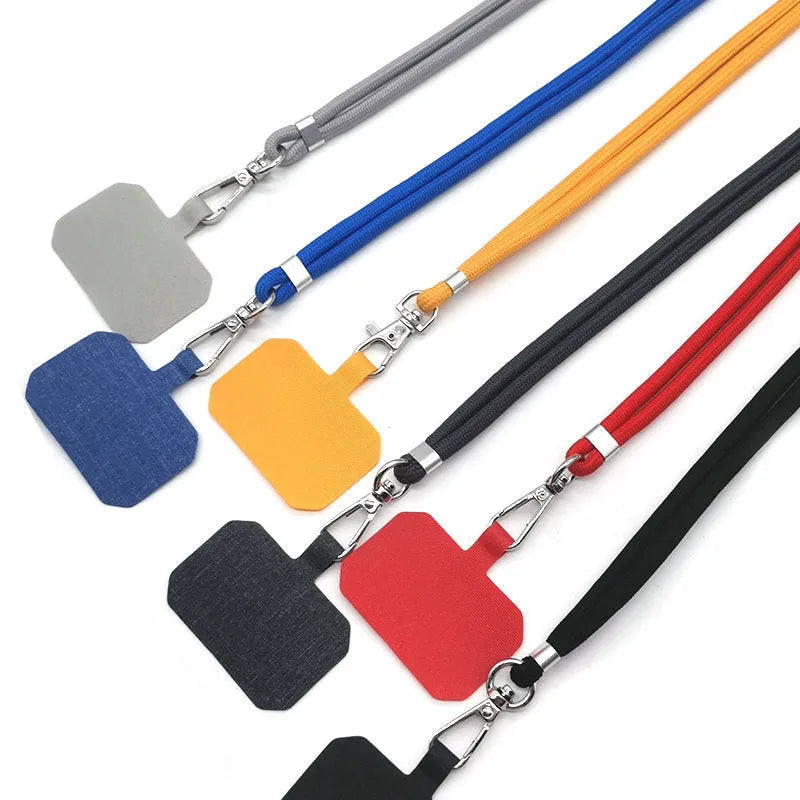 Universal card phone case lanyard in aramid fibre with electroplated carbon fibre skin, shown in multiple pure colours.