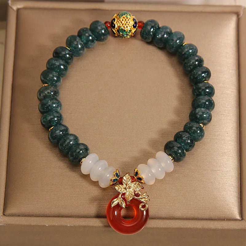 Blue water jade and red agate peace buckle crystal bracelet for women.