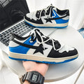 Men's low-top colorblock sneakers in white blue with rubber sole and lace-up design