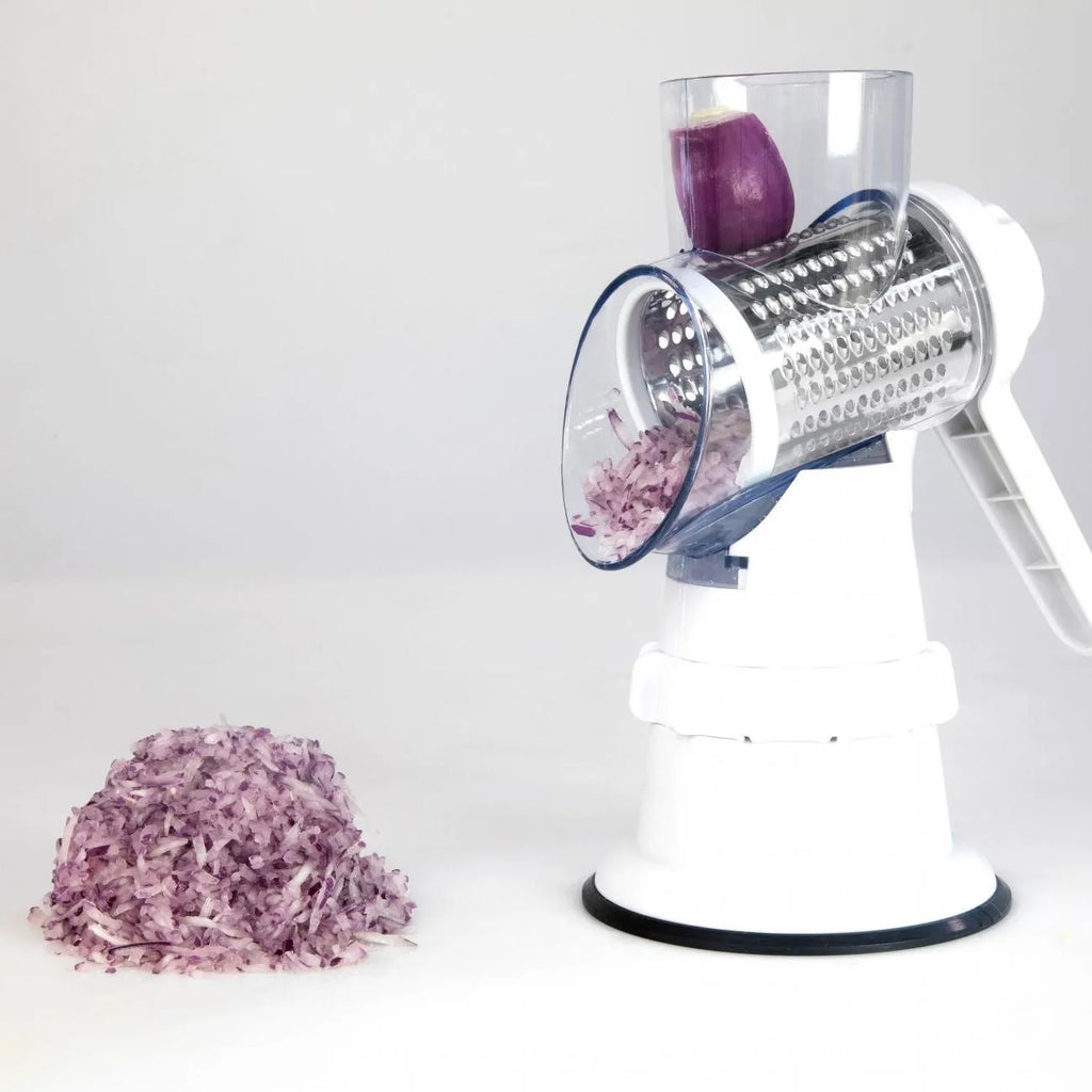 White 3-in-1 manual vegetable slicer with stainless steel blades on kitchen counter
