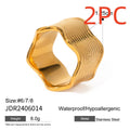Stainless steel wide band ring with geometric wave pattern and polished electroplated finish
