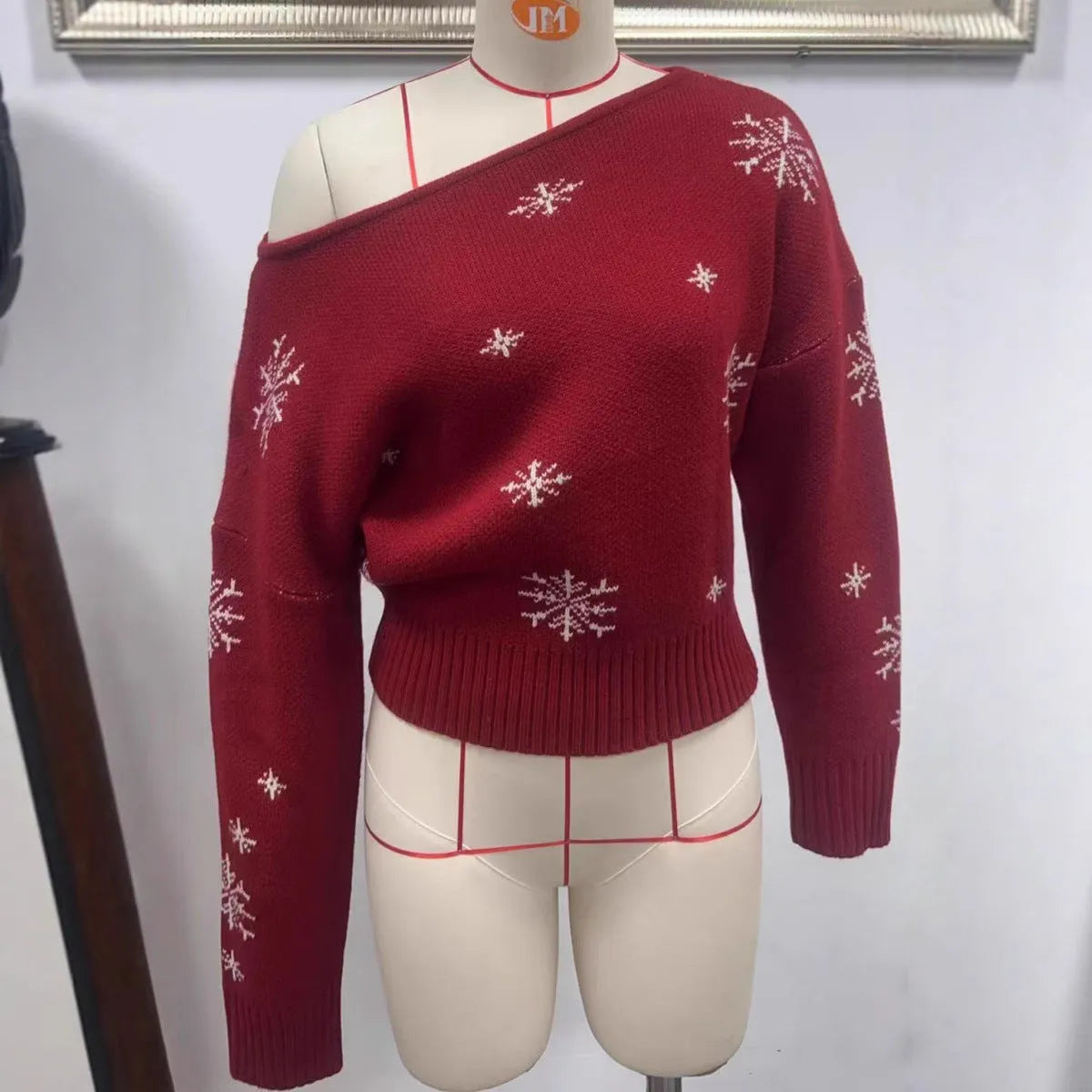 Women's red snowflake jacquard boat neck pullover Christmas sweater with crocheted flowers