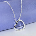 Silver heart necklace for women with 45.5cm chain and 2.6 x 2.8cm heart pendant in thick silver plating over copper.