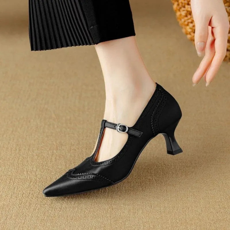 Women's black and white French vintage style stiletto heels with engraved skull pattern design