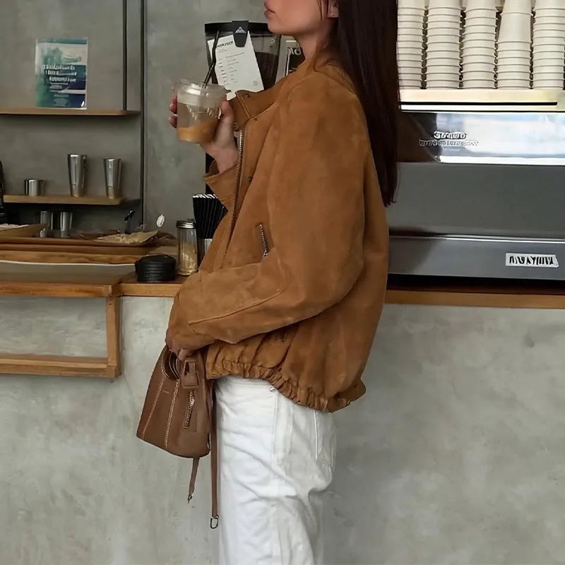 Retro solid colour loose-fit long sleeve jacket on a hanger.