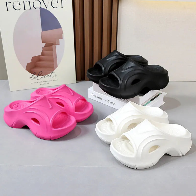 Women's thick-soled EVA slippers in white, black, or rose red colours with rounded toe design