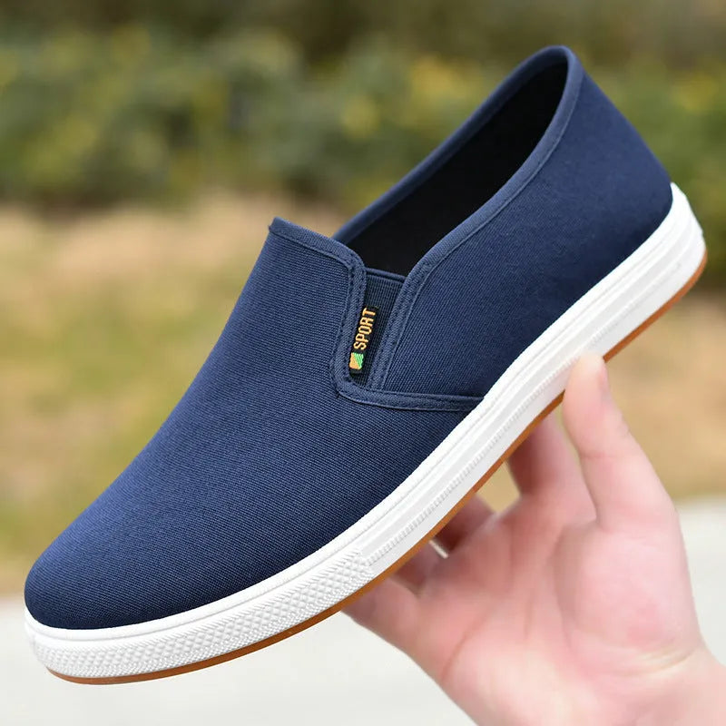 Men's black and blue slip-on canvas cloth shoes with round toe and injection moulded sole