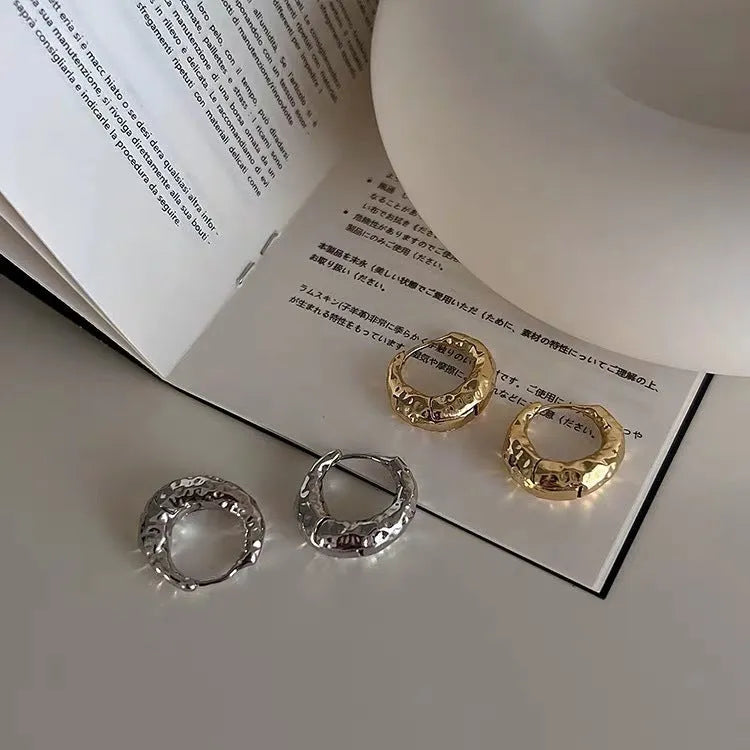 Pair of women's irregular croissant hoop earrings in copper with electroplated silver or gold finish