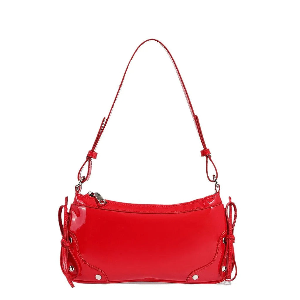 Solid colour PU underarm bag with double bow and rivet decoration, horizontal square shape