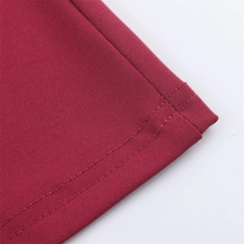 Women's red cotton pleated long dress with asymmetric skirt and stripe pattern on model