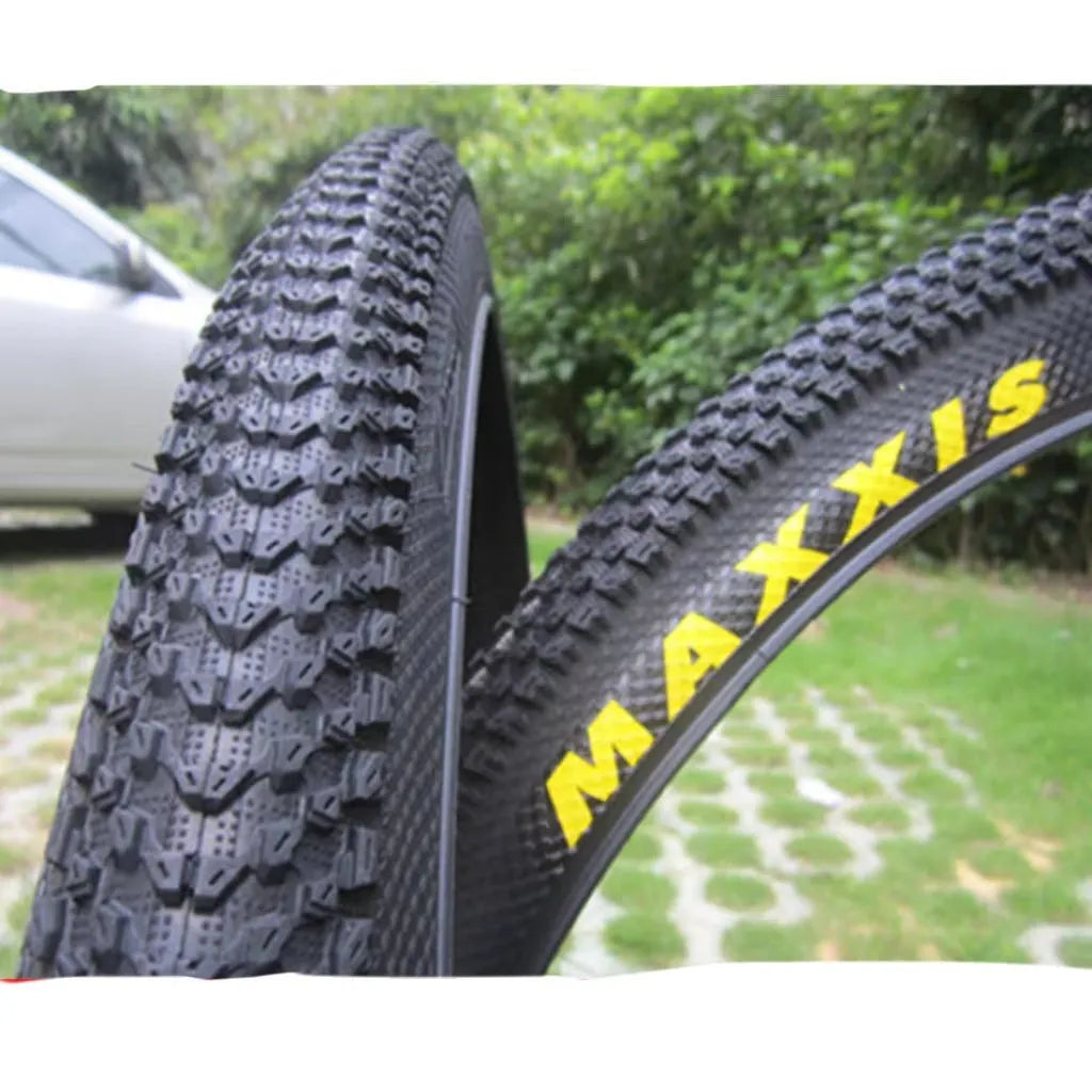 Ultralight puncture proof mountain bike tyre shown in 26, 27.5, and 29 inch sizes with black and white label sidewall options.