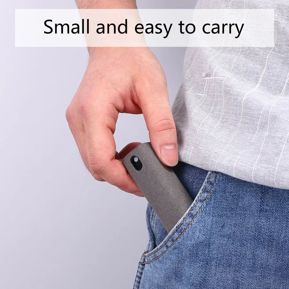 Mobile phone screen cleaner with integrated spray bottle and microfiber in compact black case