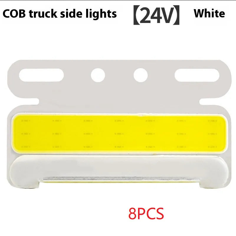 Waterproof aluminium alloy LED side light for trucks, showing bright COB illumination in blue, mounted near a vehicle tyre.