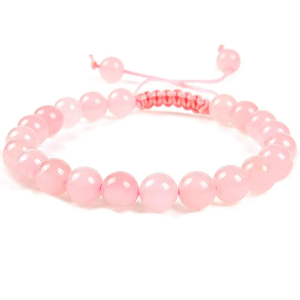 Women's flat knot braided healing bracelet with hand-woven aquamarine beads and geometric patterns