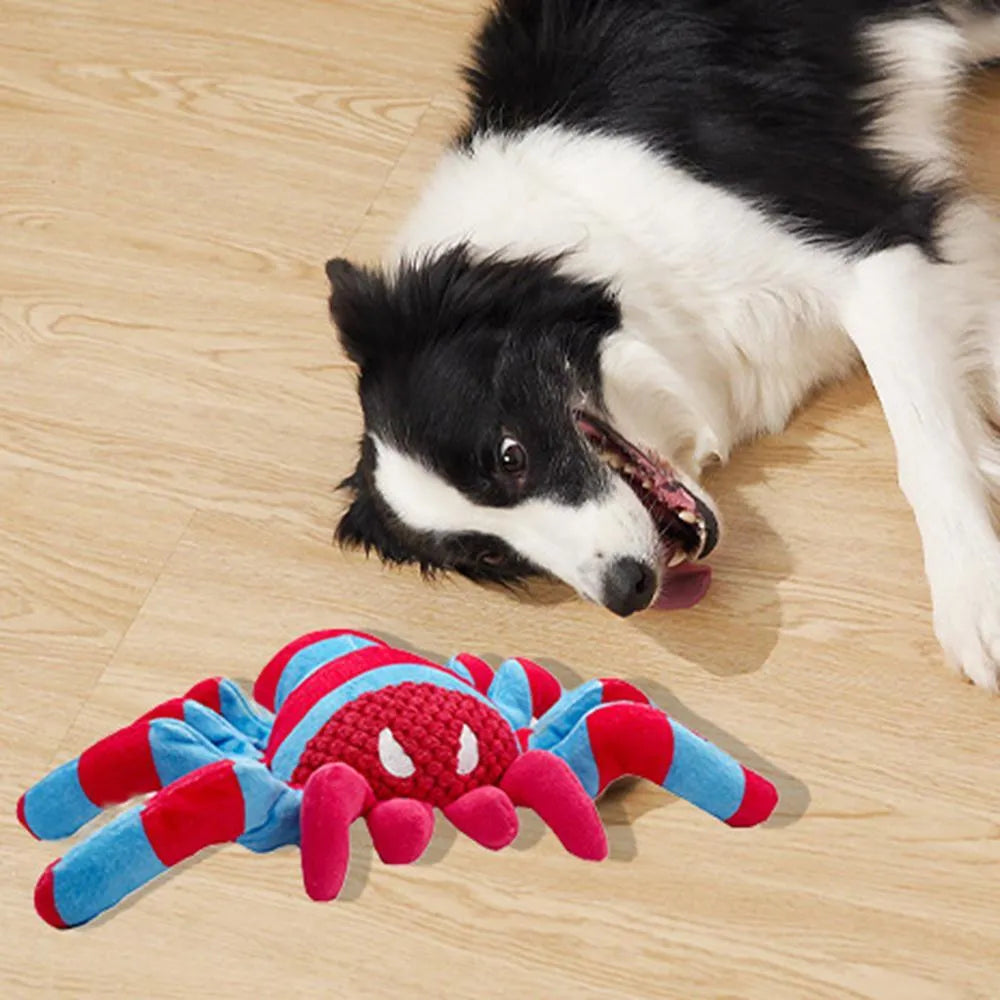Red teddy bear dog toy for medium and large breed puppies on a neutral background.