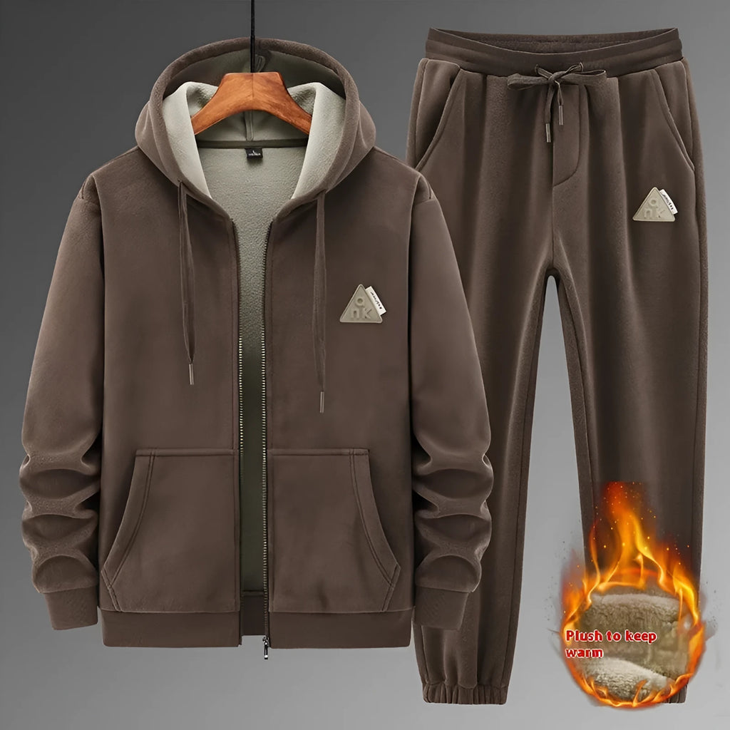 Grey cashmere-blend hooded sweater and matching trousers laid flat as a casual sports suit set.