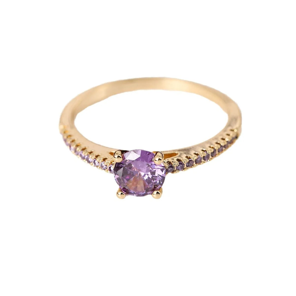 A geometric hexagonal copper ring with a central zircon stone, shown in a gun black and rose red electroplated finish.