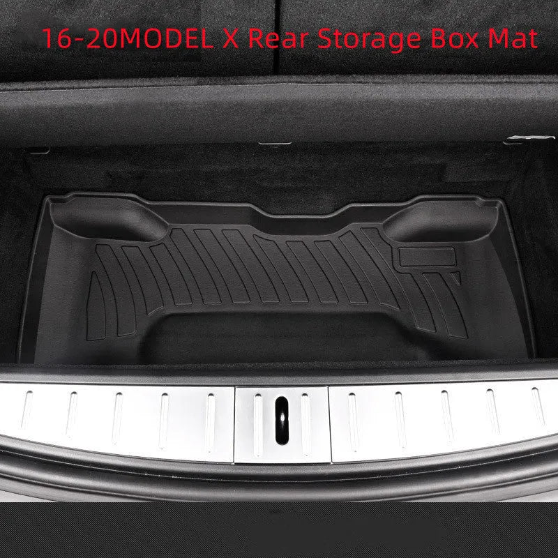 Rubber and TPE floor mat set for a Tesla car interior.