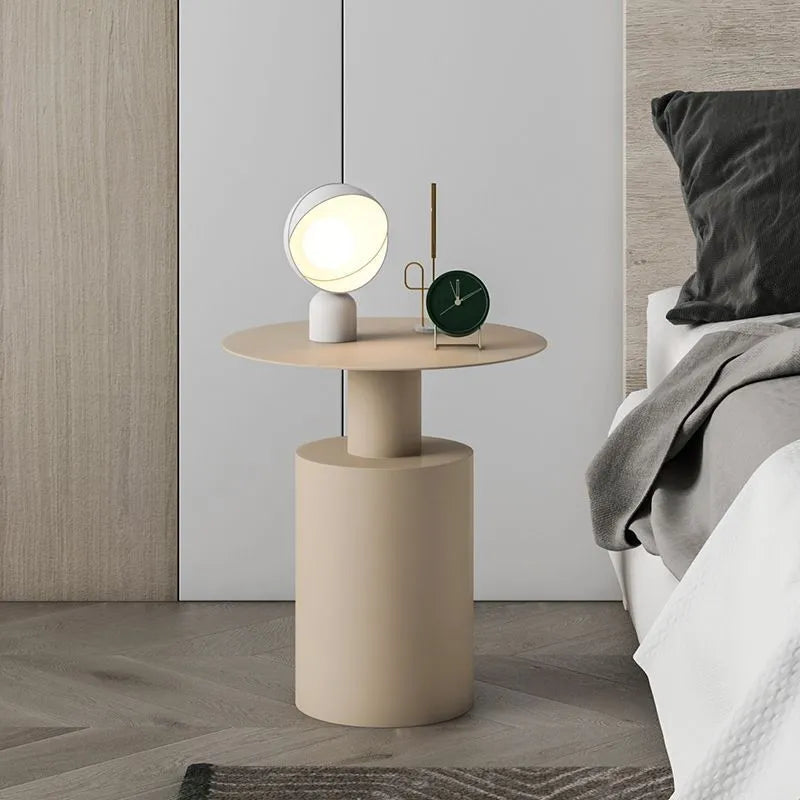 Nordic style round metal bedside table in beige with simple modern design for bedroom use