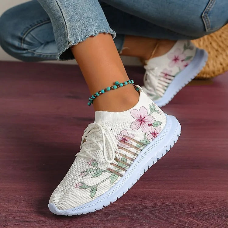 White women's mesh knit running shoes with round toe and flat rubber sole