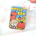 Small iron craft storage tin with colourful printed design measuring 9.5cm long